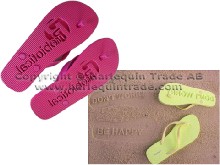 Flip flops with debossed logo